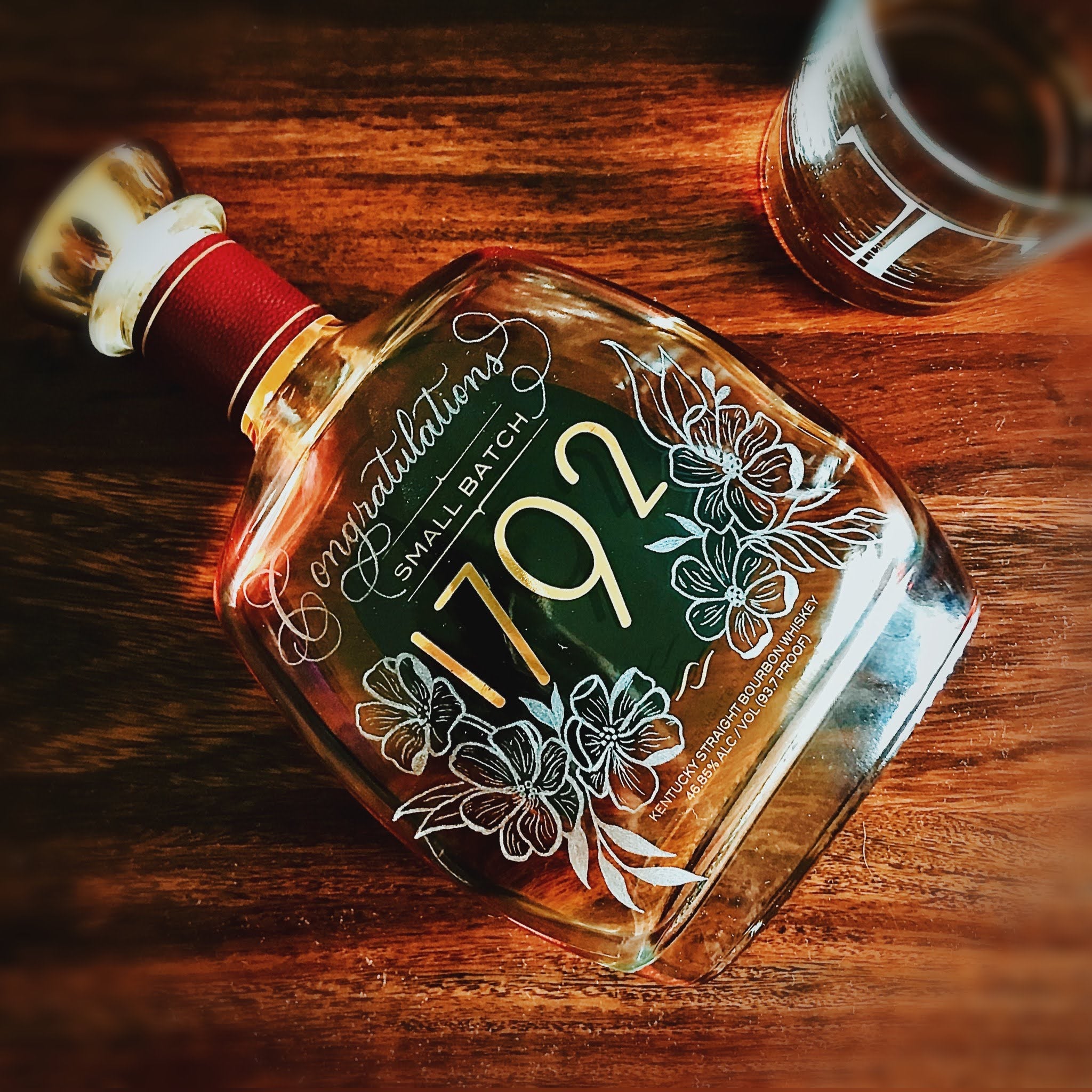 Small Batch 1792 Whiskey Bourbon bottle engraved with the word "Congratulations" on top and surrounded with modern florals.